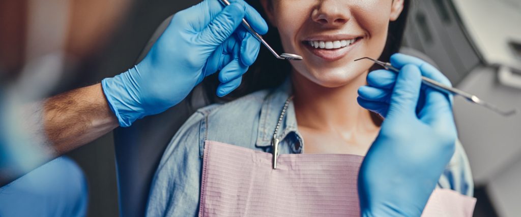 close up of woman getting dental checkup general dentistry dentist in Monroe North Carolina